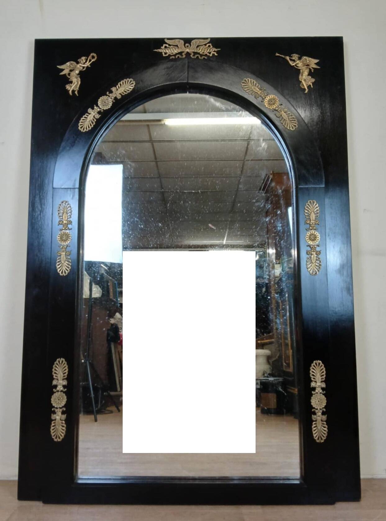 Miroir Empire en bois laqué noir et bronze doré époque XIXeme