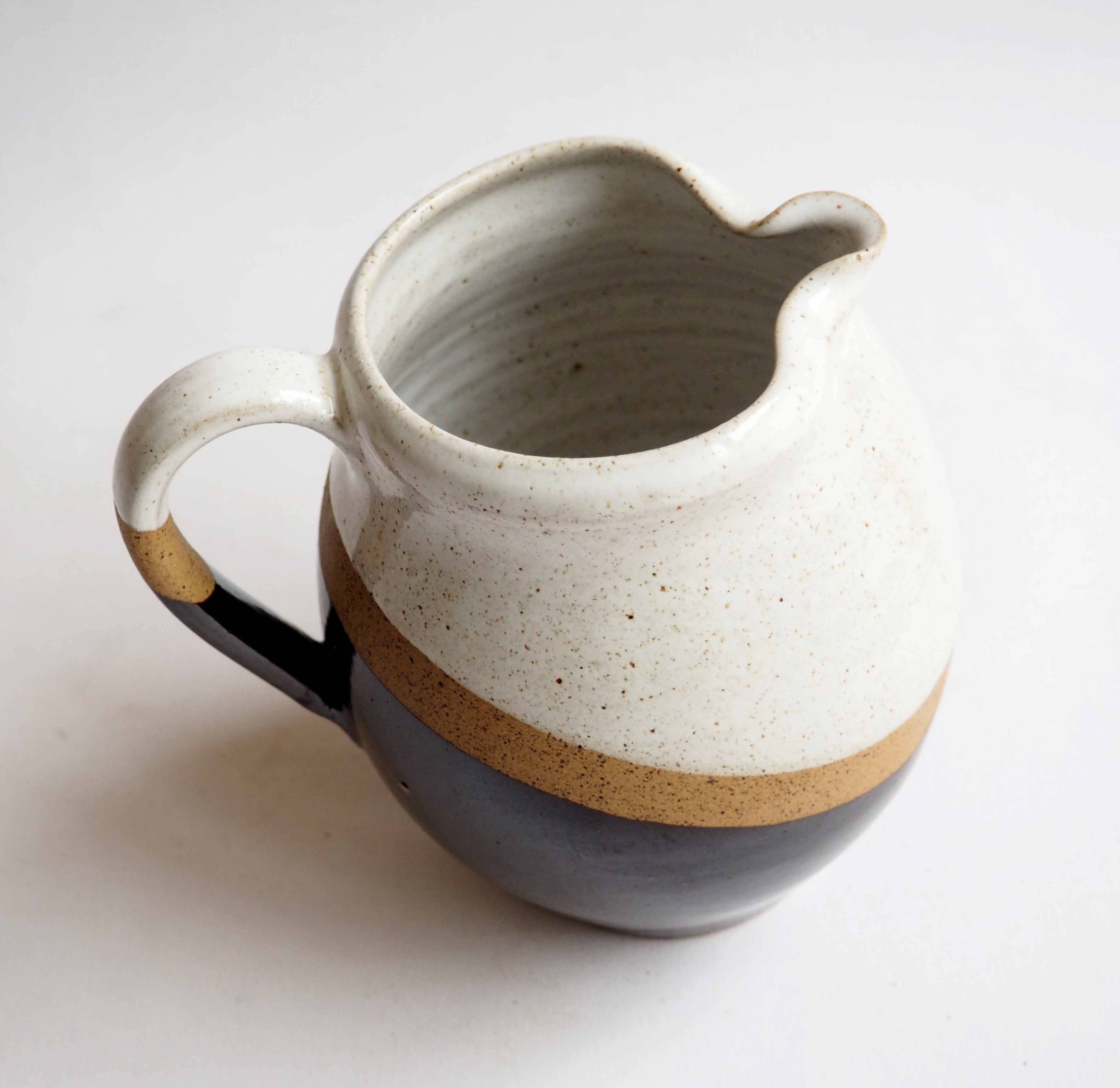 Tricolor stoneware pitcher