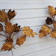 Paire d'appliques murales fleur feuillage en métal doré par Hans Kögl, 1970