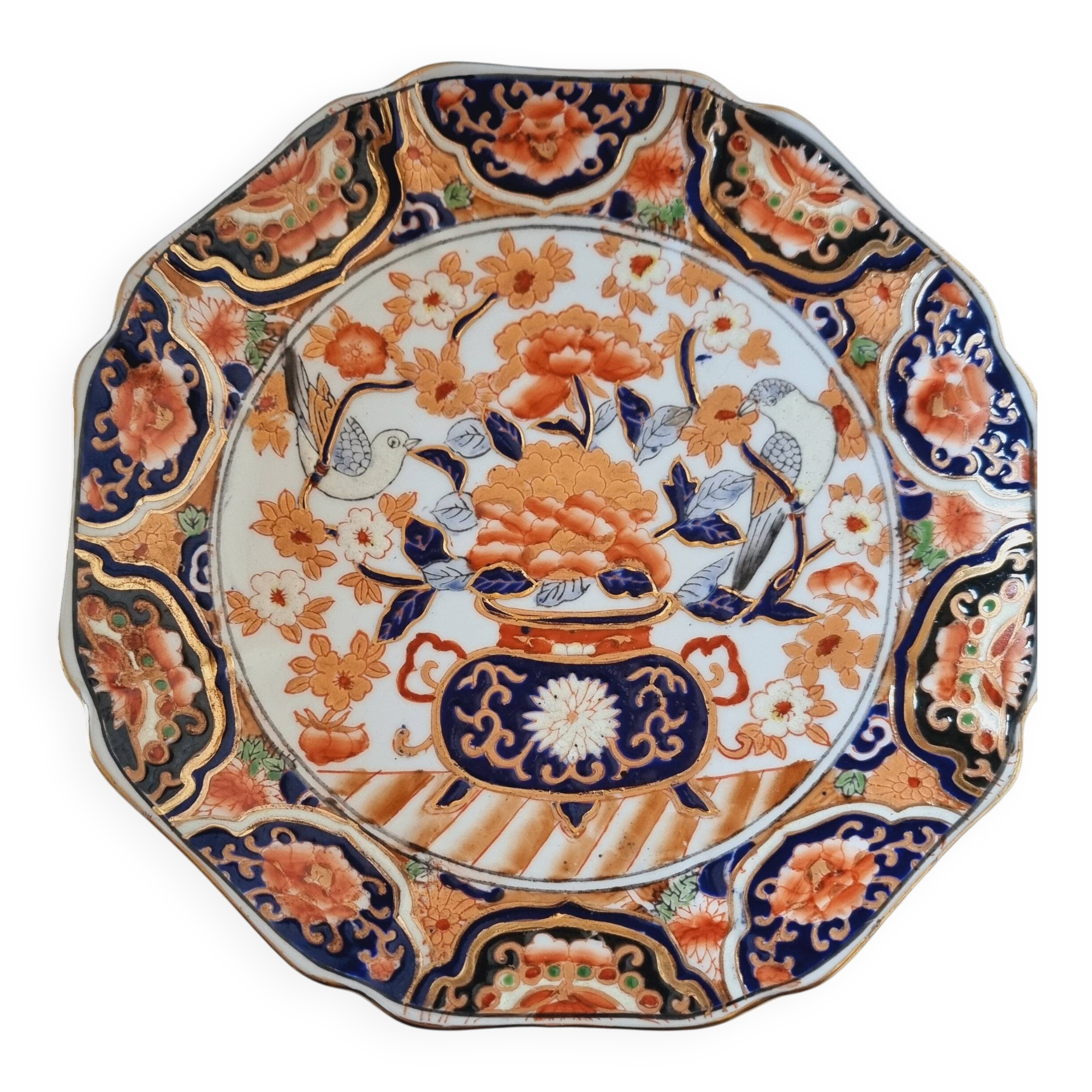 Imari-style porcelain plate, hand-painted, Japan, mid-20th century.