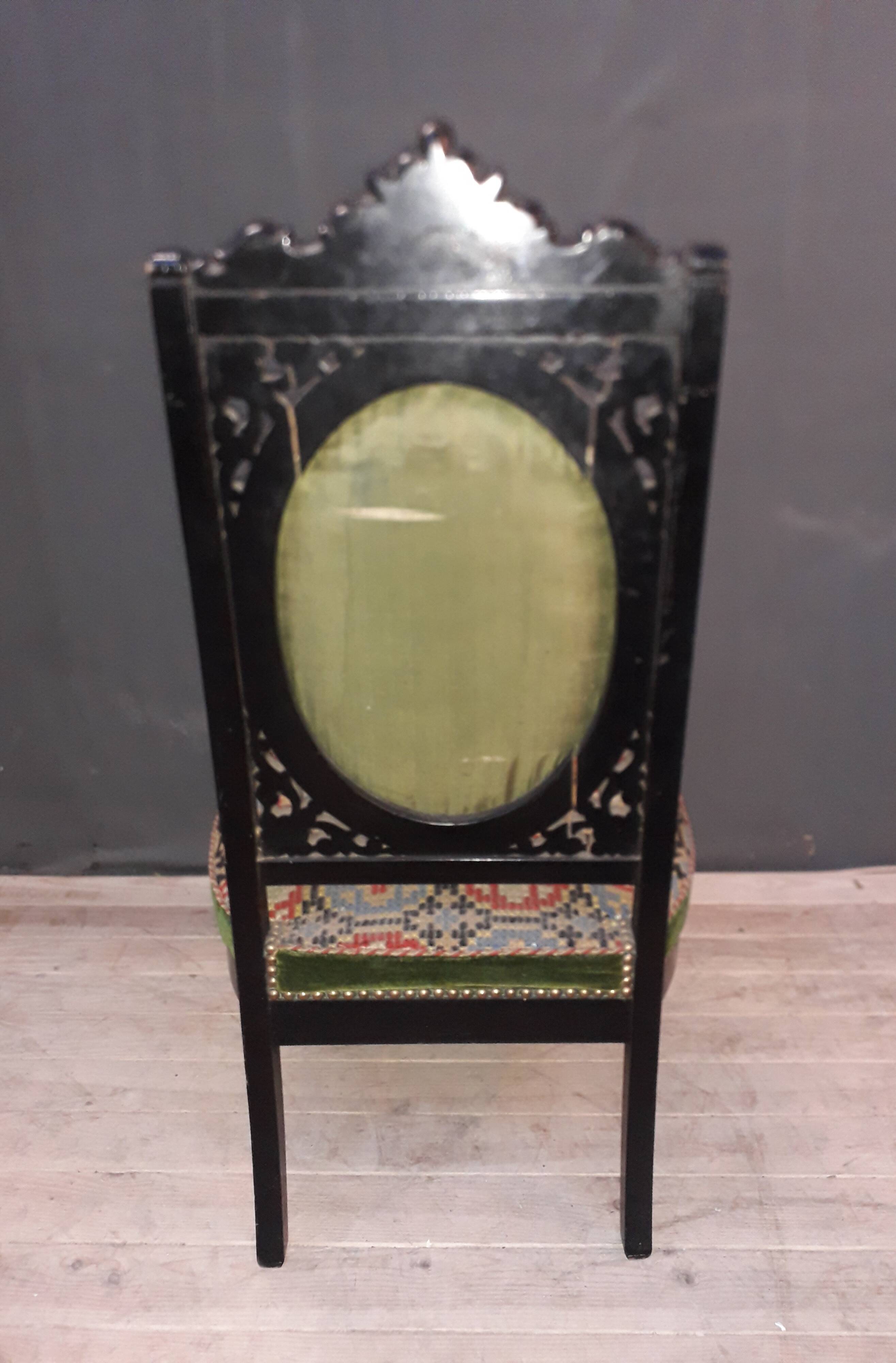 Blackened wooden chair