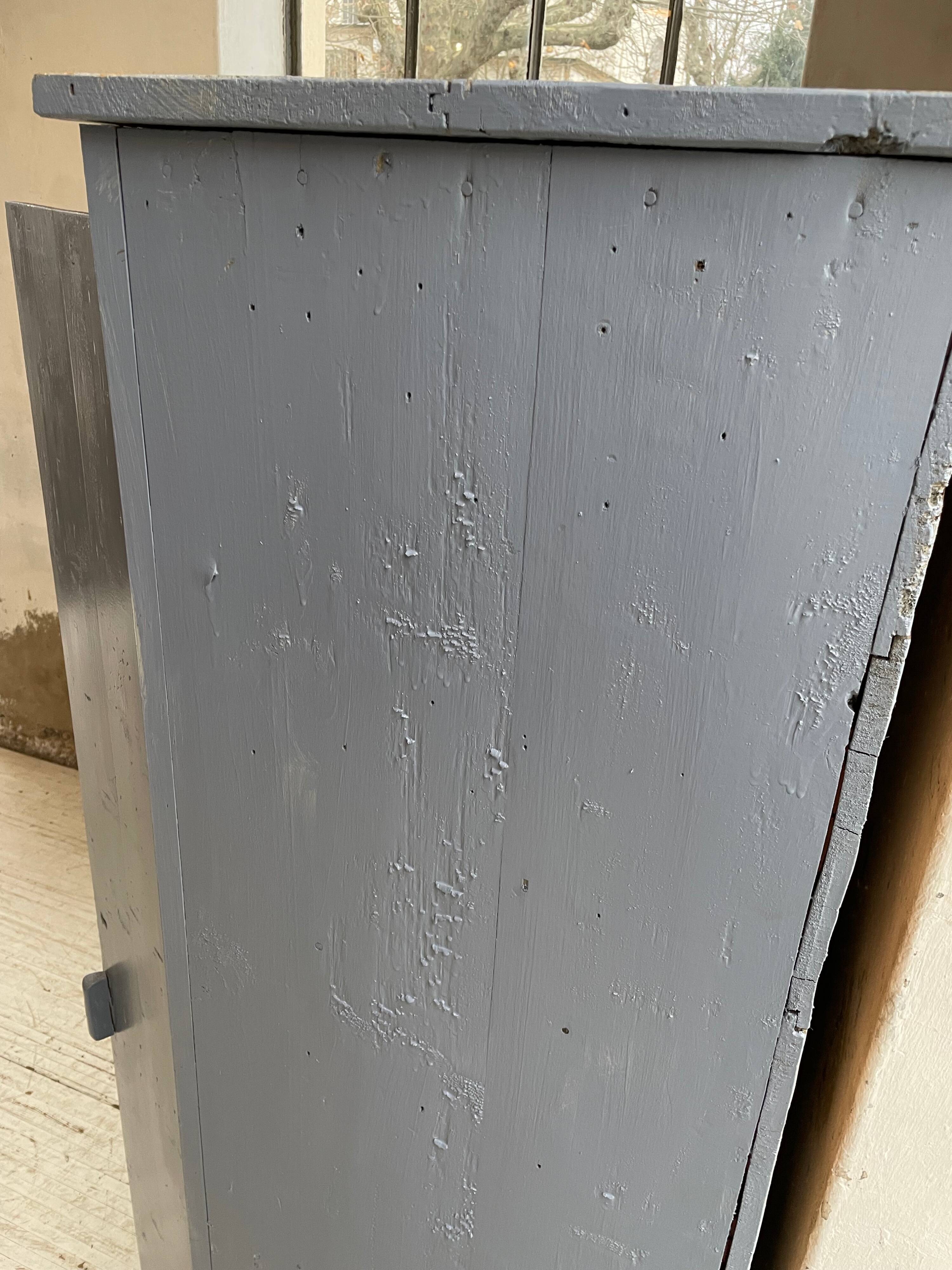 Blue patinated workshop furniture locker room