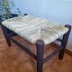 Moroccan bench in dark wood with woven palm leaf seat