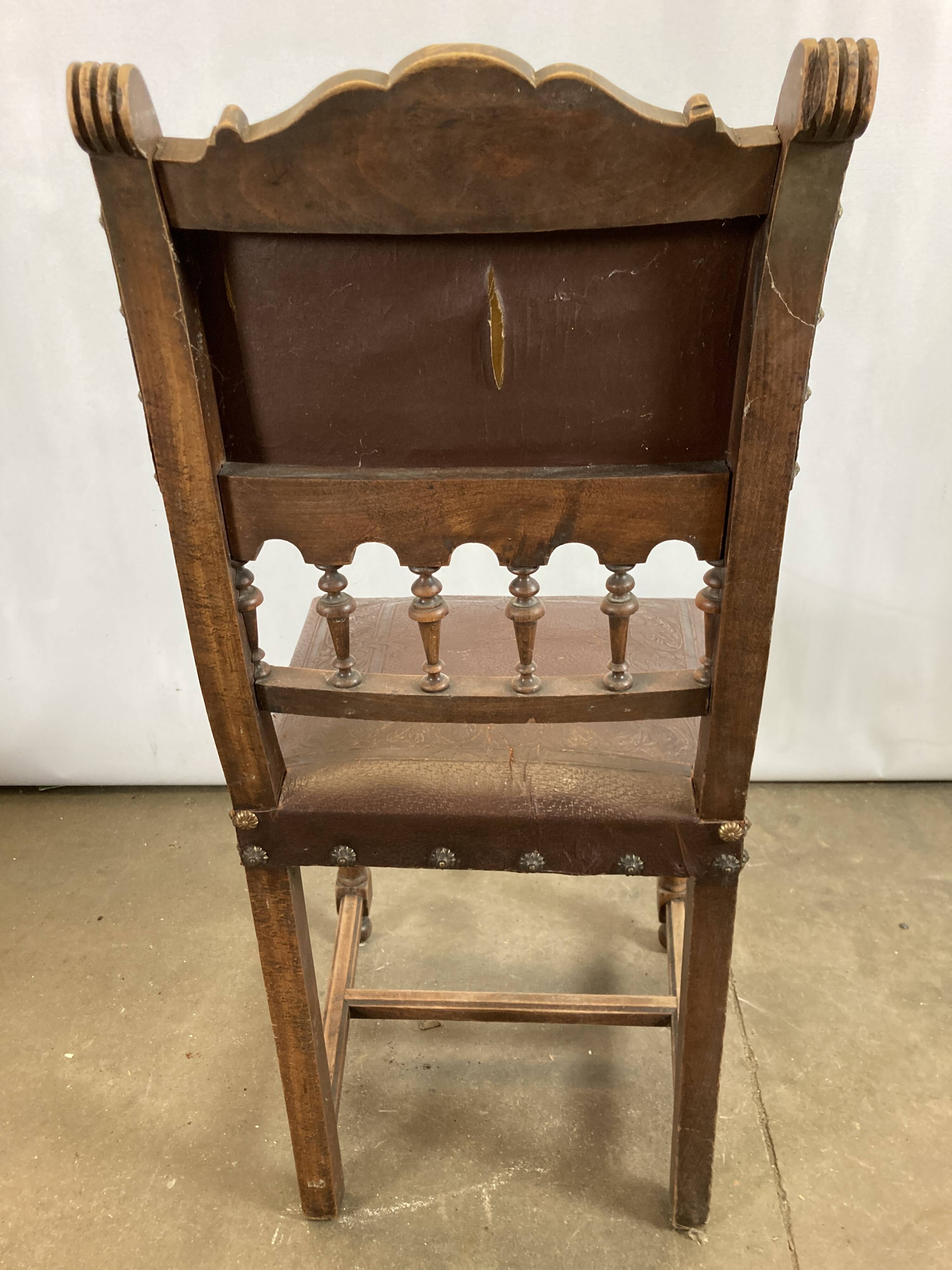 Pair of Henry II wooden and leather chairs