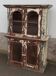Old patinated wooden glass cabinet