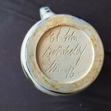 Signed pitcher to be identified