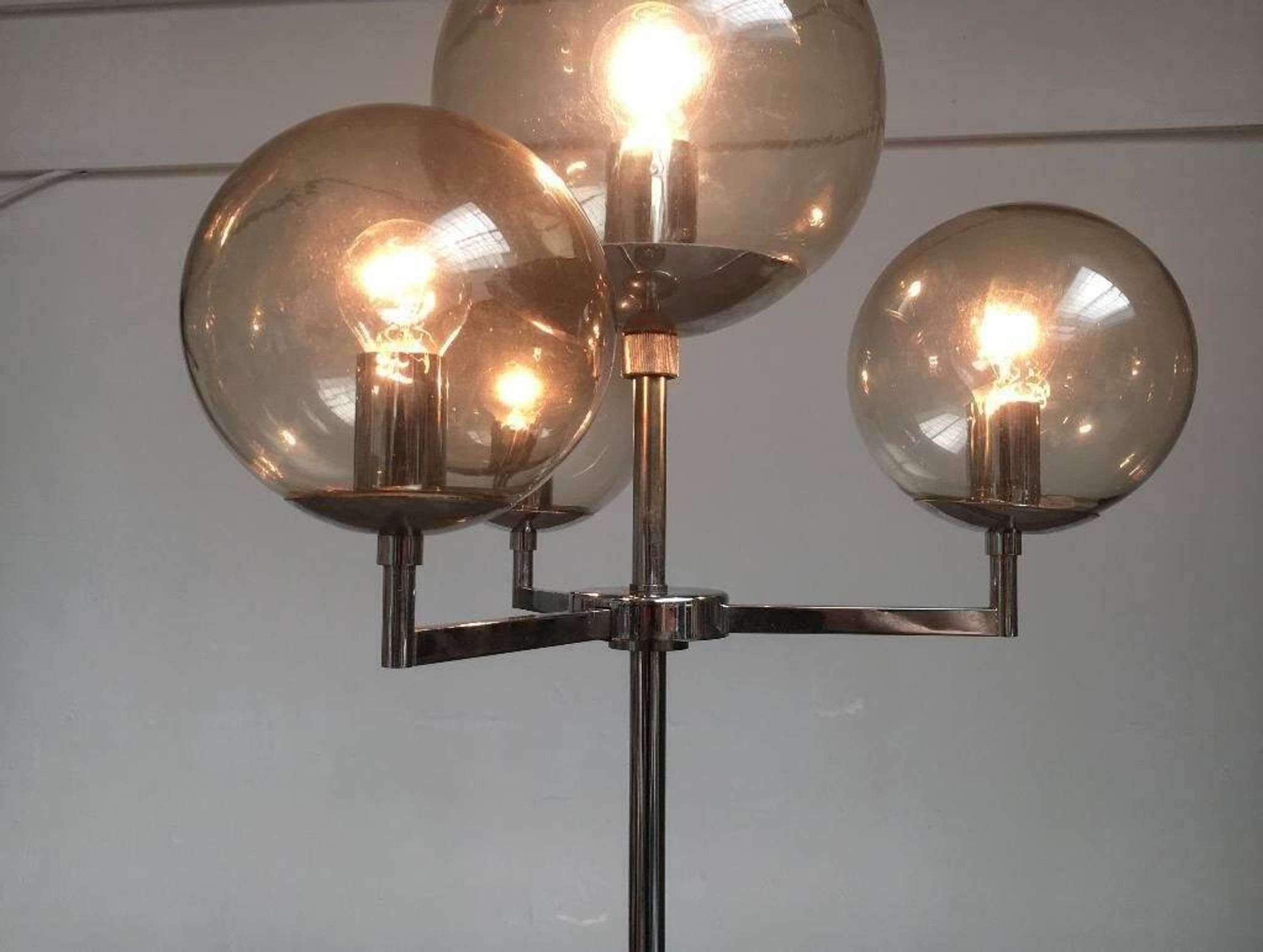Chrome and glass floor lamp in mid-century German space style by Hustadt Leuchten, 1960s.