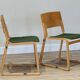 A set of four chairs in light oak (Theo chairs by Chorus)
