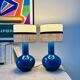 Paire de lampes "boule" en porcelaine - 1970