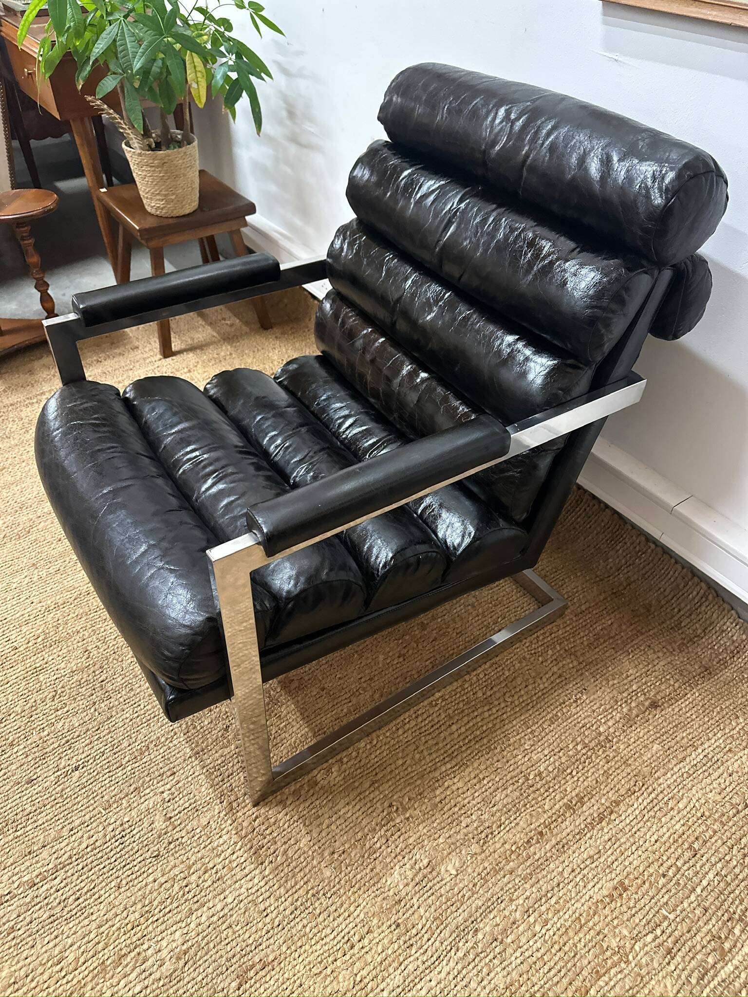 Vintage 1970s black leather armchair – metal frame