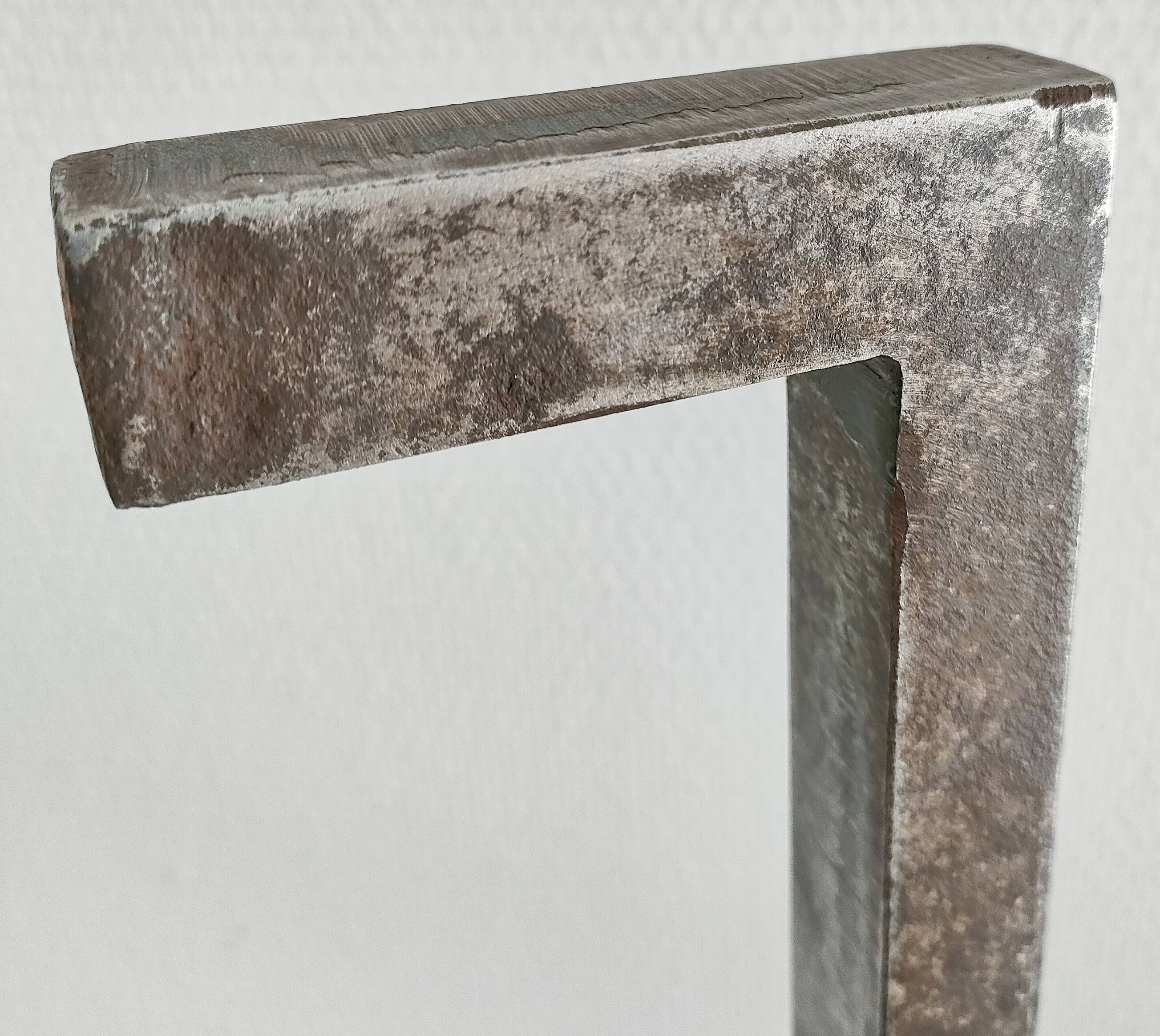 Pair of vintage steel fleur-de-lys andirons