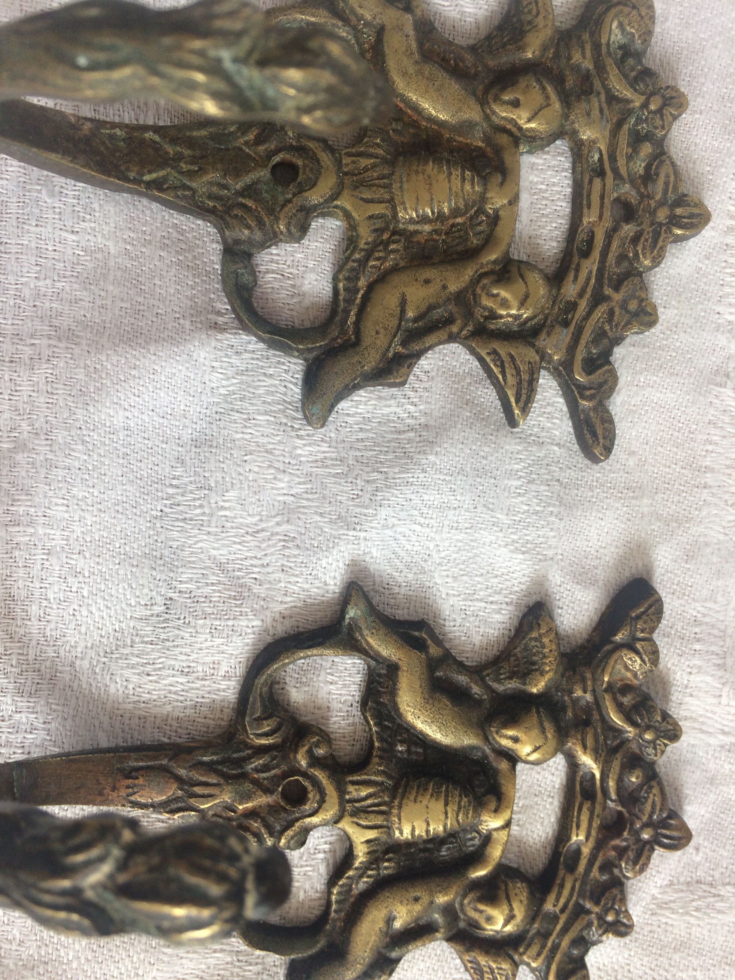 3 old hooks in bronze