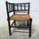 Turned wooden corner chair