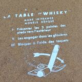 Side table from the 60s Whisky table top in black glass and gilded metal tripod base in