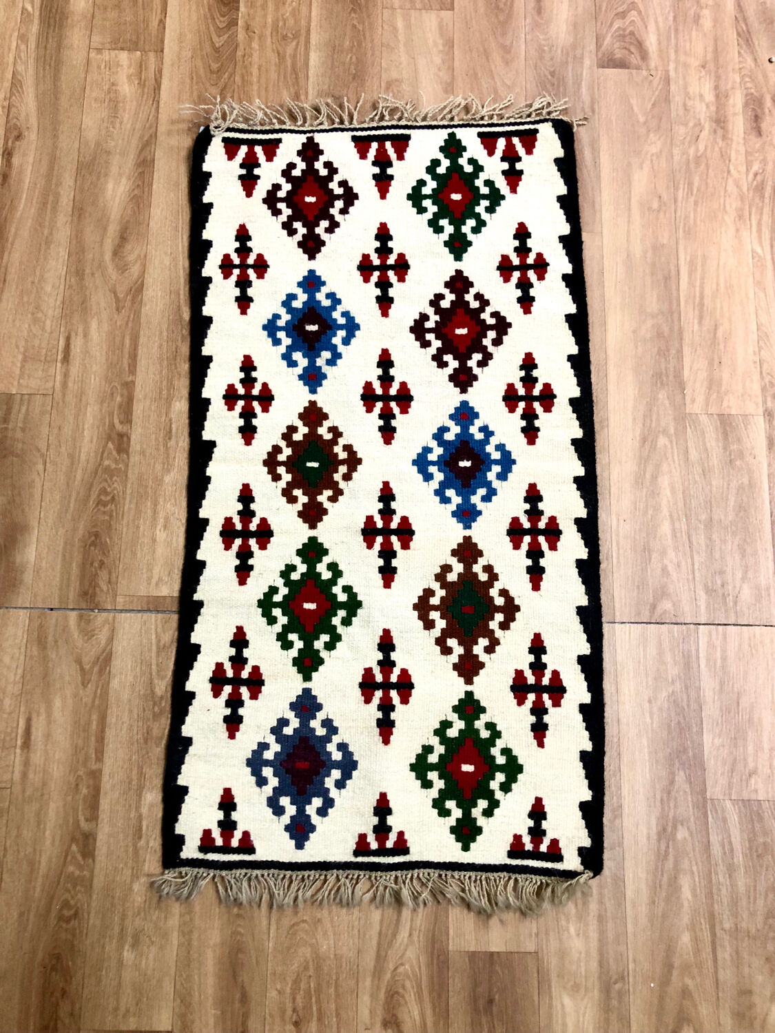 Small ethnic carpet