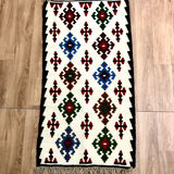 Small ethnic carpet