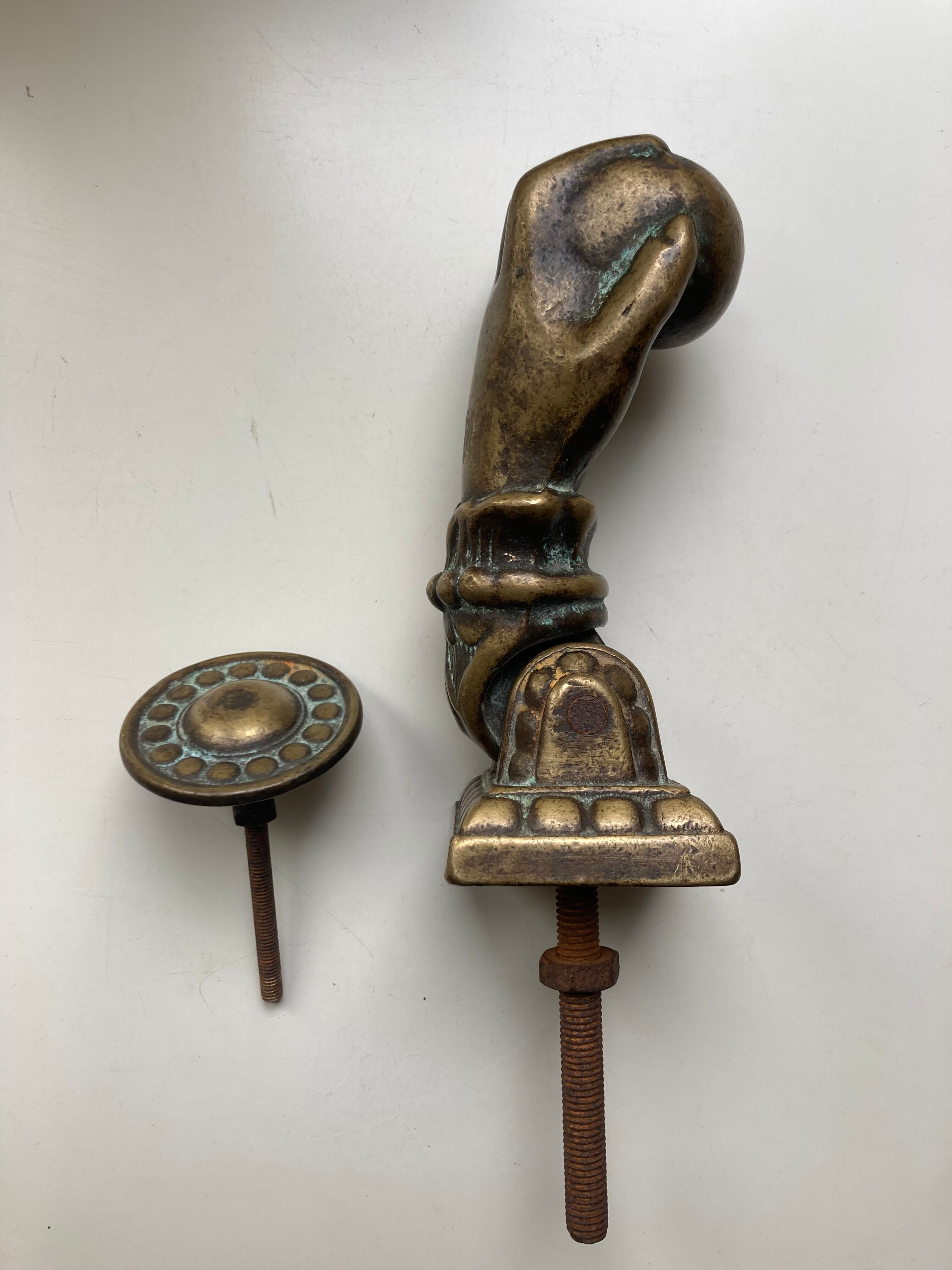 Antique bronze hand-shaped door knocker