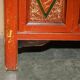 Vintage Chinese lacquered buffet decorated with gold leaf.
