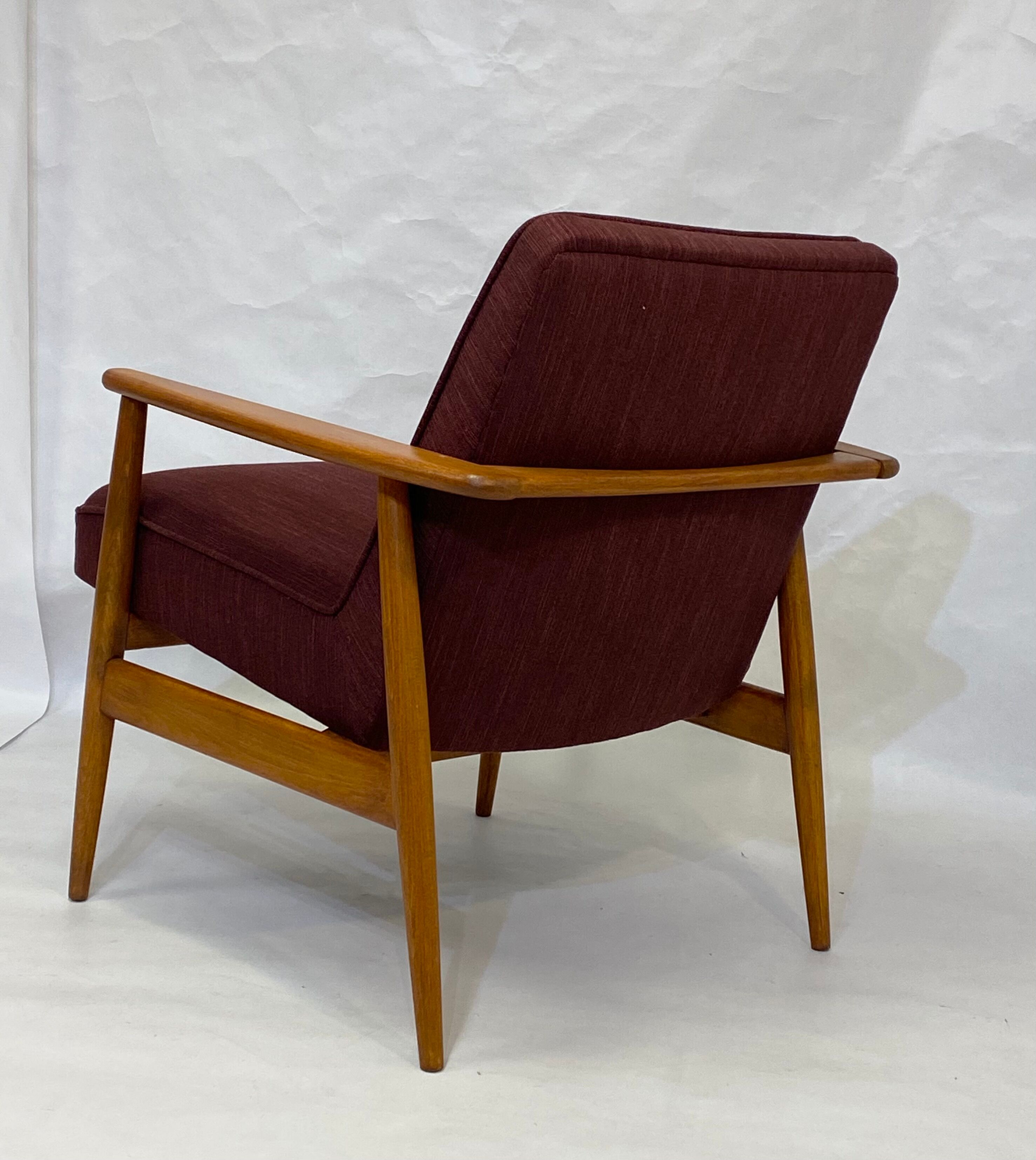 Chair created by Mr. Zieliski year 60 burgundy fabric.