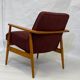 Chair created by Mr. Zieliski year 60 burgundy fabric.