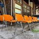 Sérié 39 chaises 4 fauteuils DSC 106 en tissu orange par Giancarlo Piretti pour Castelli