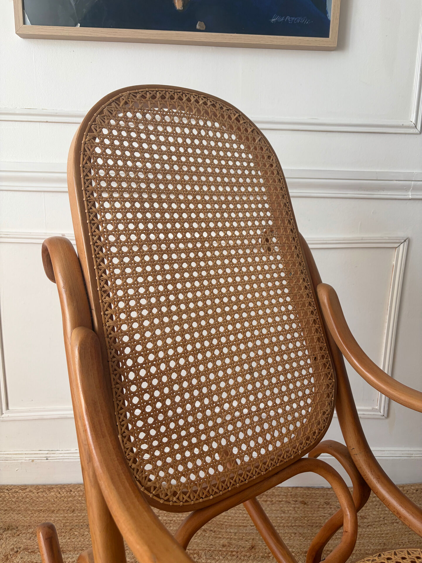 Curved wooden rocking chair