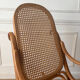 Curved wooden rocking chair