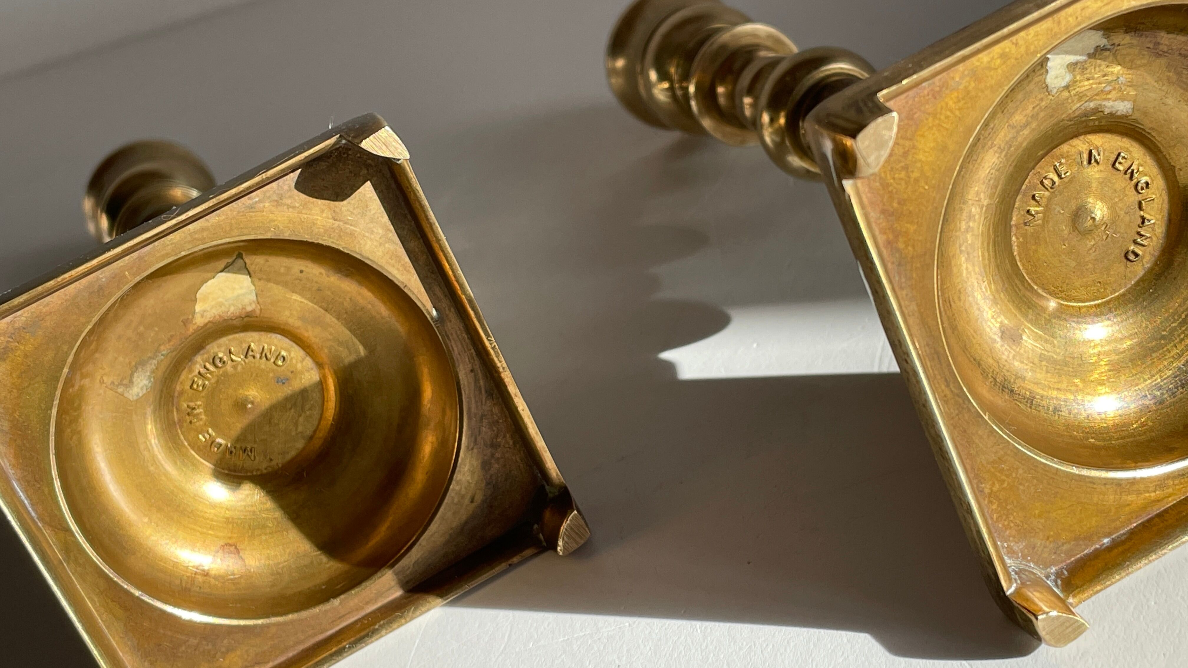 Pair of brass candle holders made in England