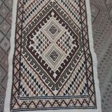 White carpet with multicolored Berber patterns handmade