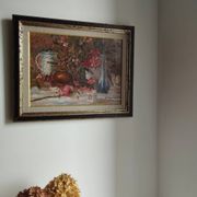 Still life with pink flowers and blue pots.