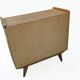 Vintage commode from the 1960s with tapered legs.