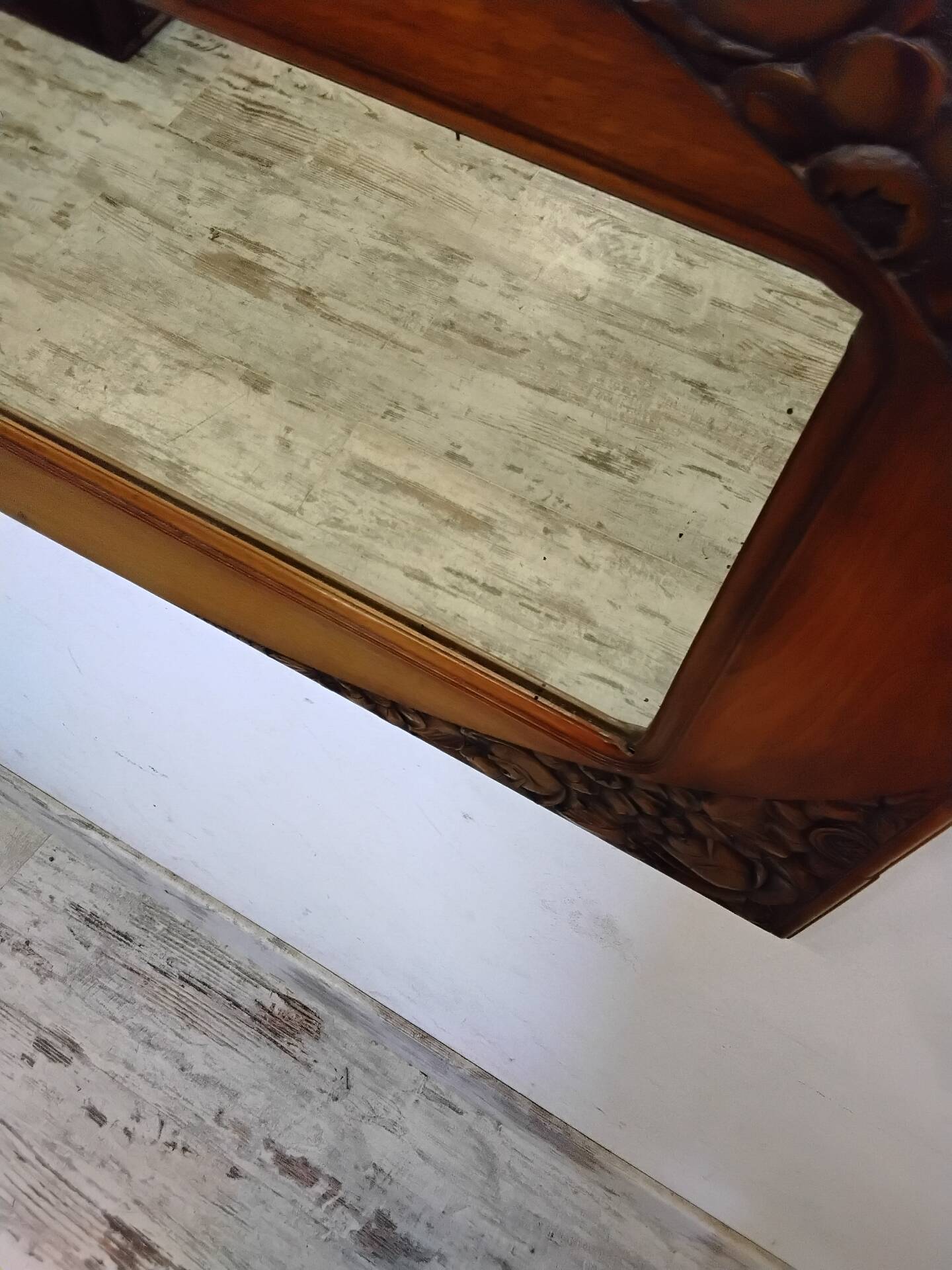 Art Deco mirror with a wooden frame