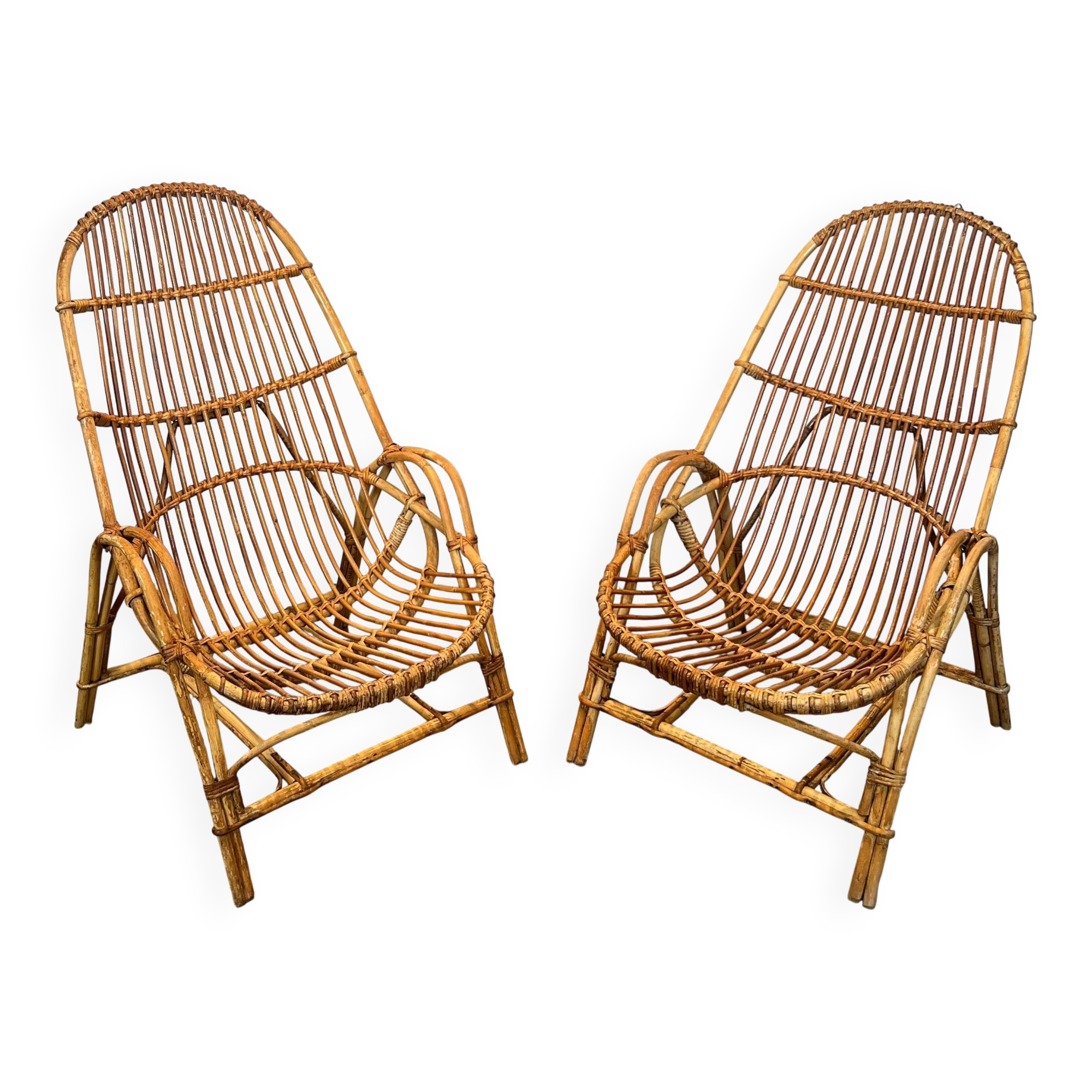 Pair of designer armchairs in rattan