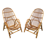 Pair of designer armchairs in rattan