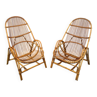 Pair of designer armchairs in rattan