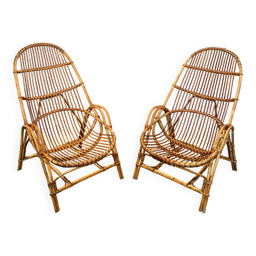 Pair of designer armchairs in rattan