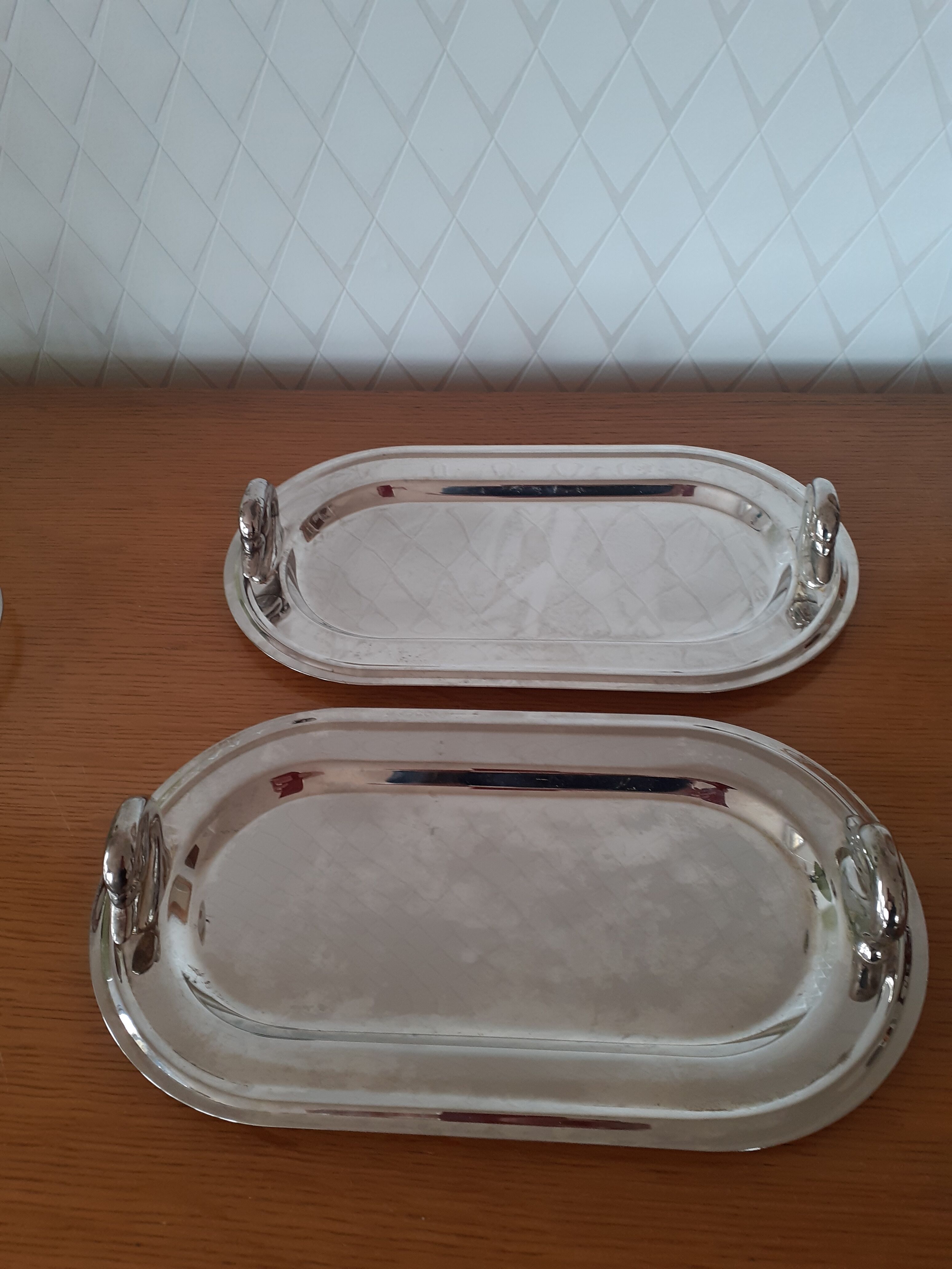 Two foie gras dishes and their toast holder
