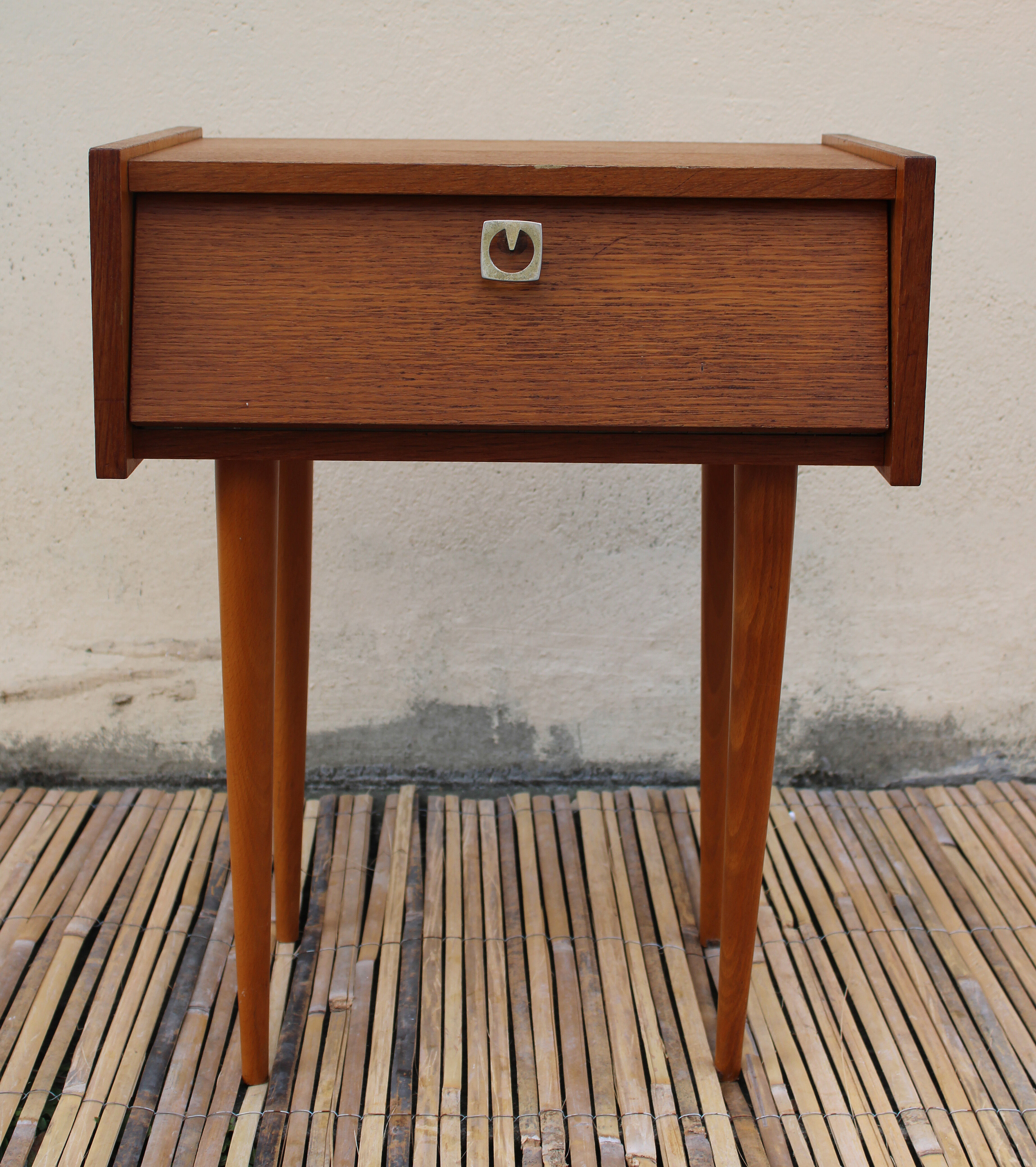 Bedside table spindle feet