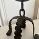 Brutalist iron candlestick Folk art