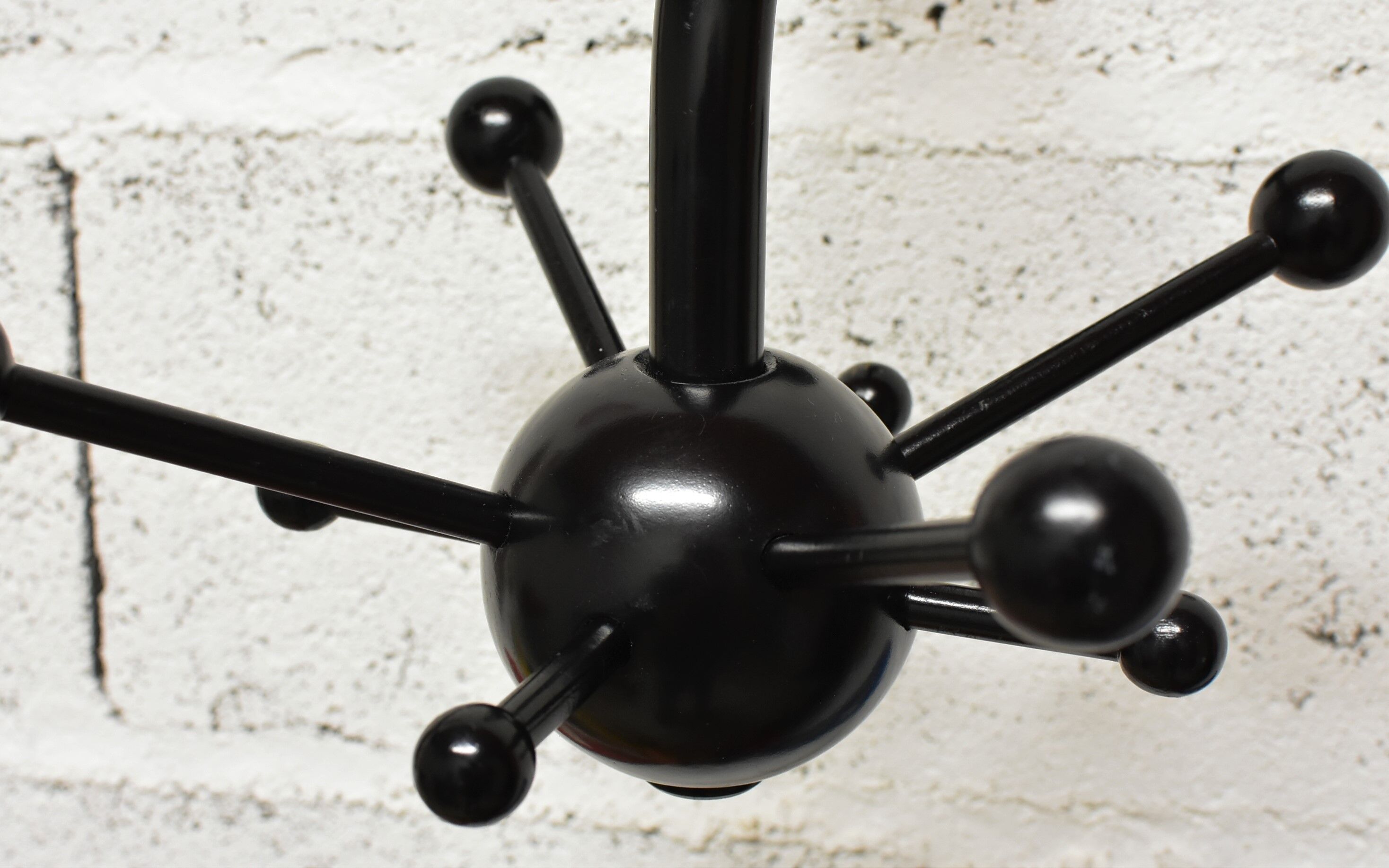 Black sputnik coat rack