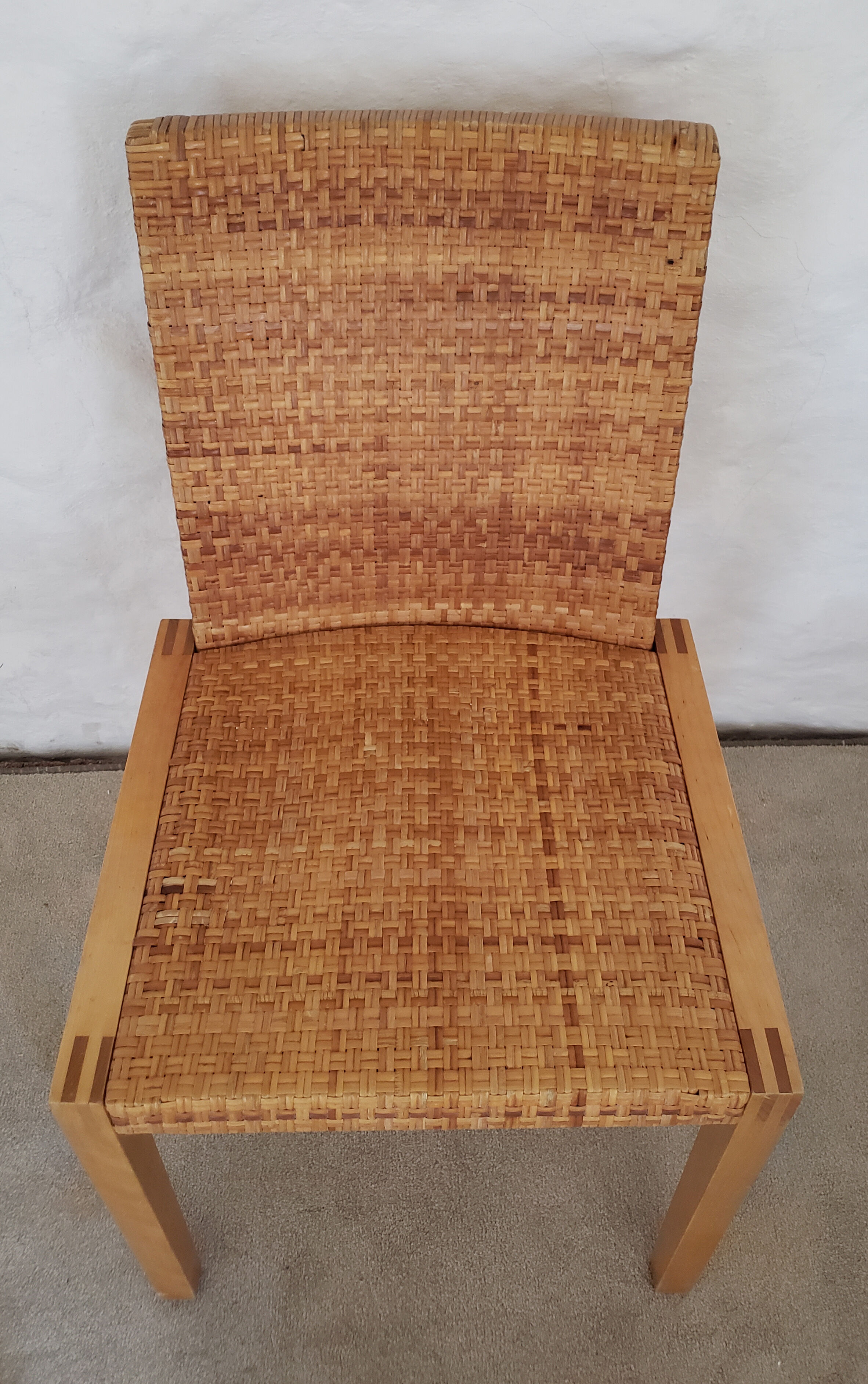 5 wooden and rattan chairs