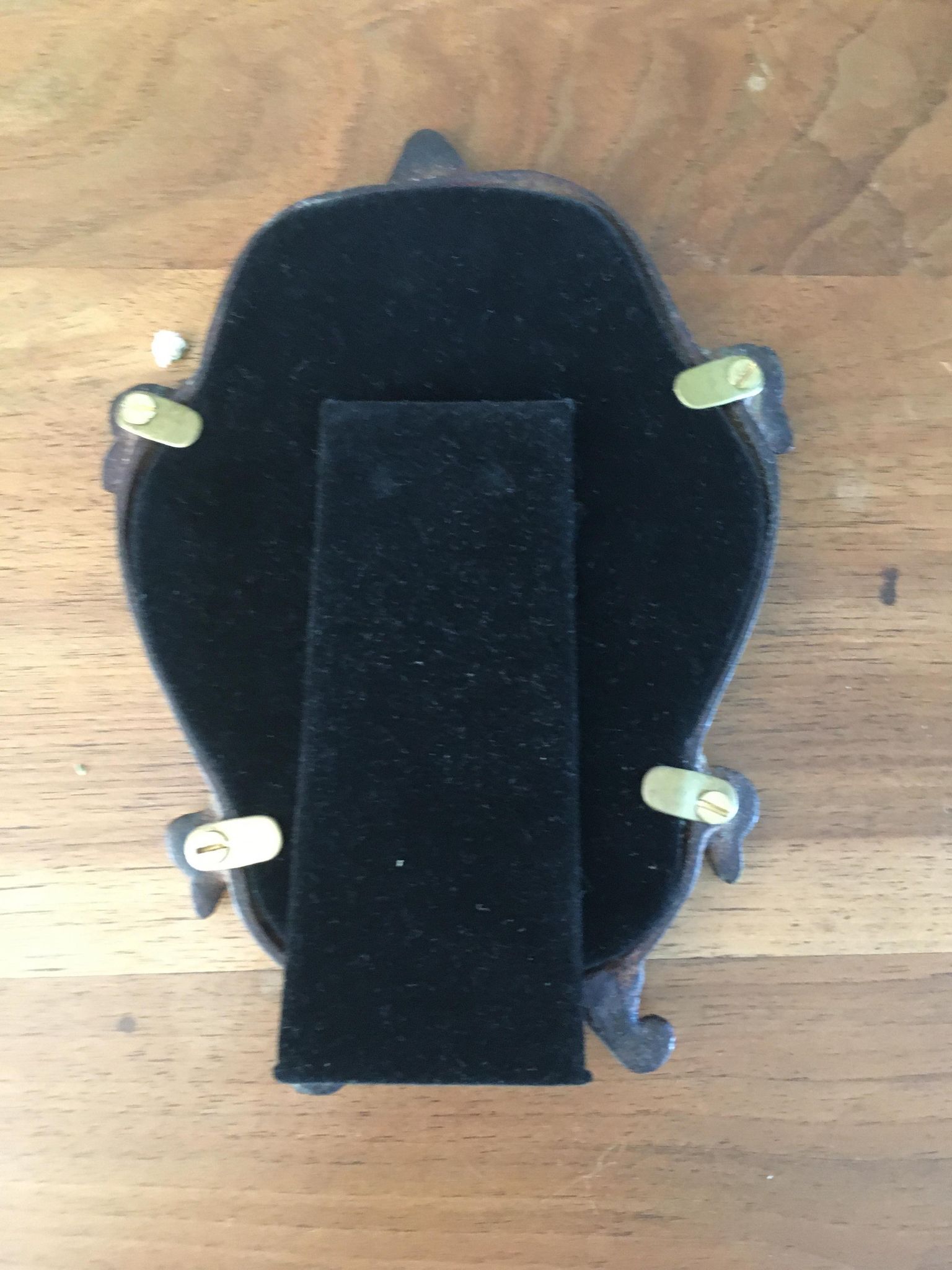 Vintage fiddle mirror to put down.