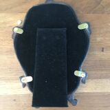 Vintage fiddle mirror to put down.