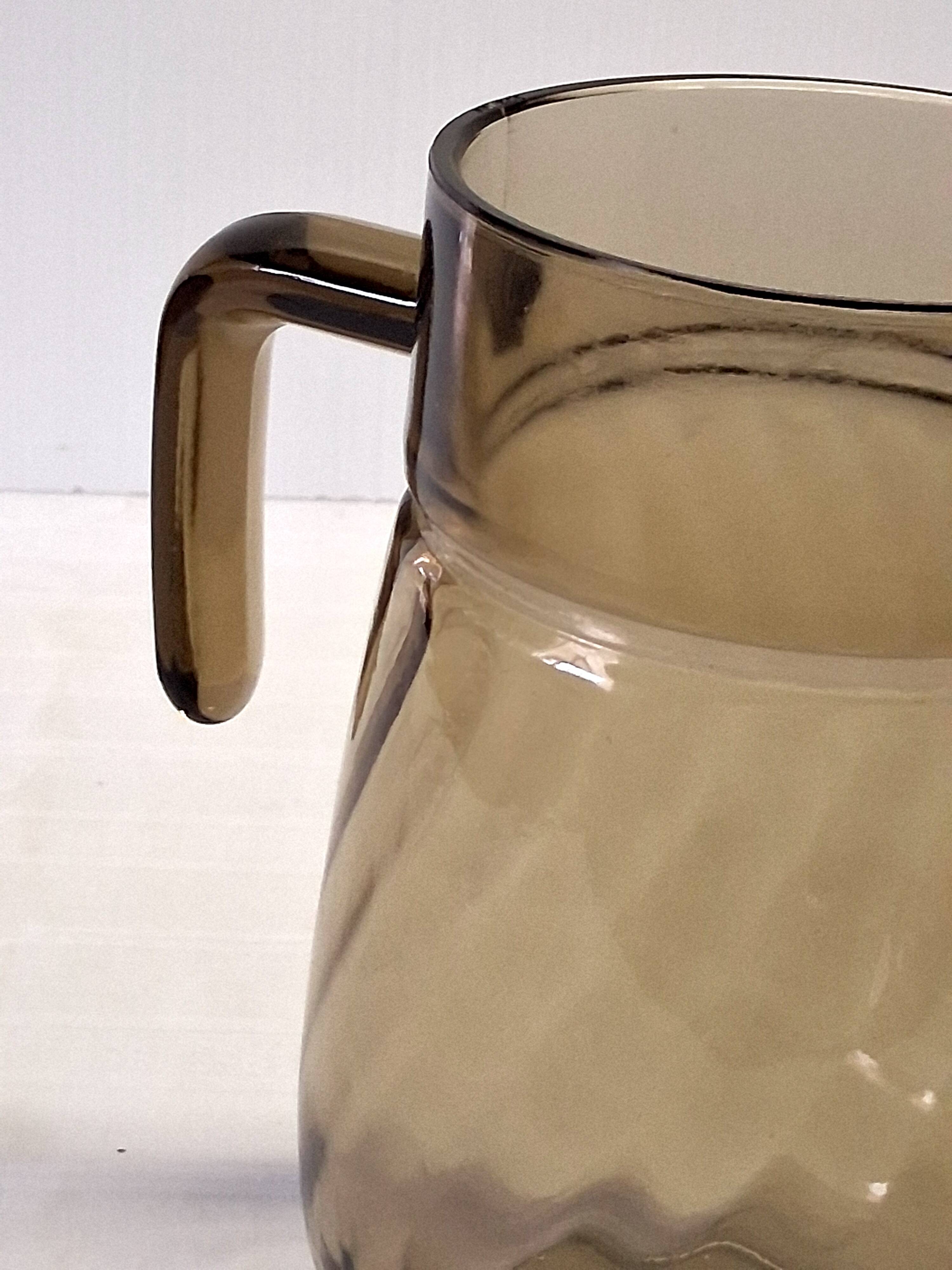 Very pretty black smoked glass pitcher from Lever in very good condition.