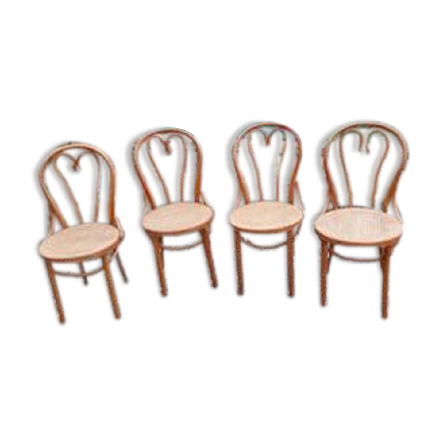 4 tanned bistro chairs
