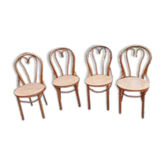4 tanned bistro chairs