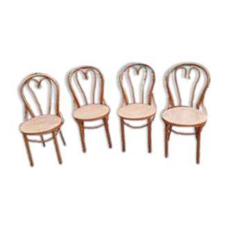 4 tanned bistro chairs
