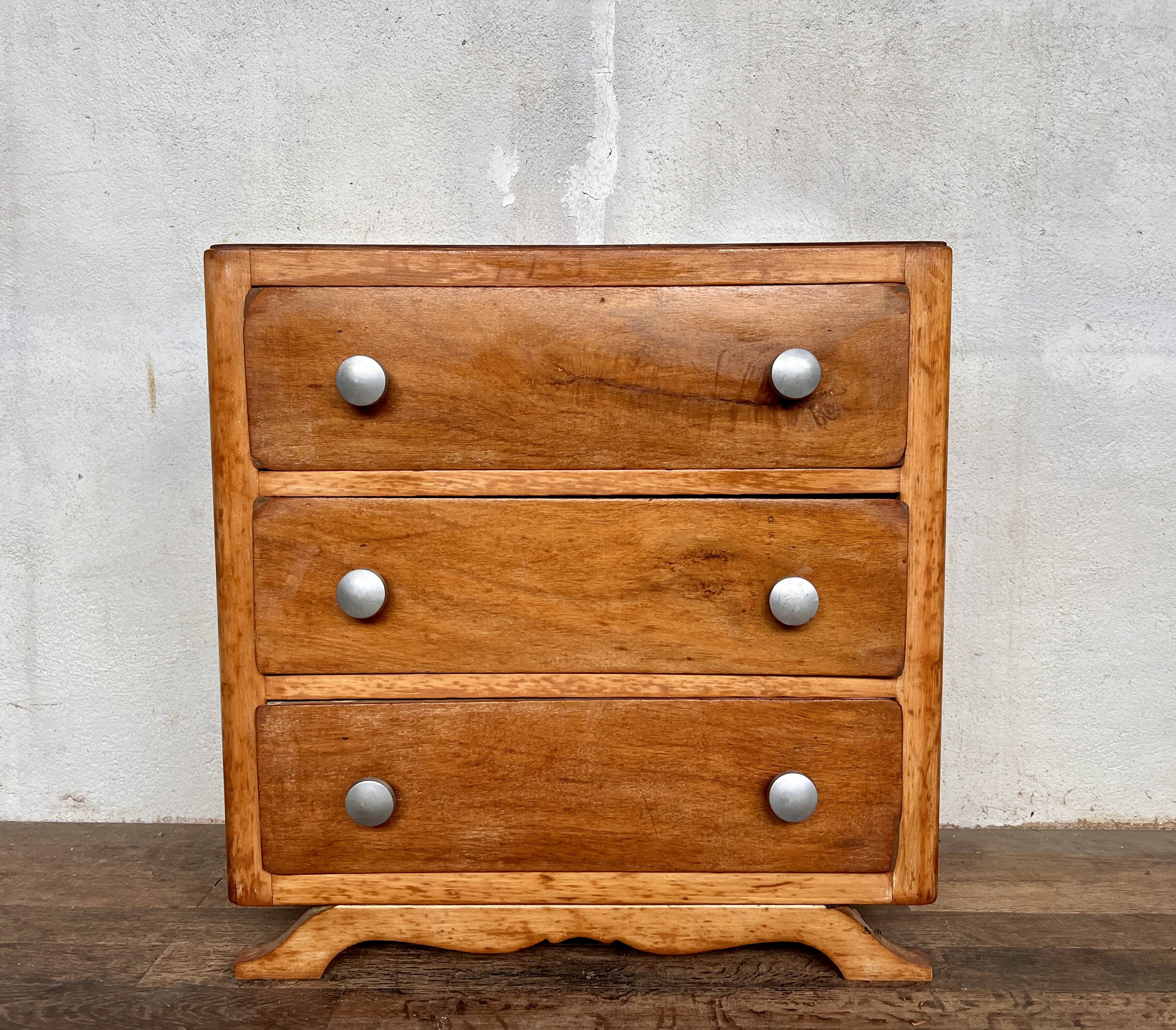 vintage art deco chest of drawers with compass feet