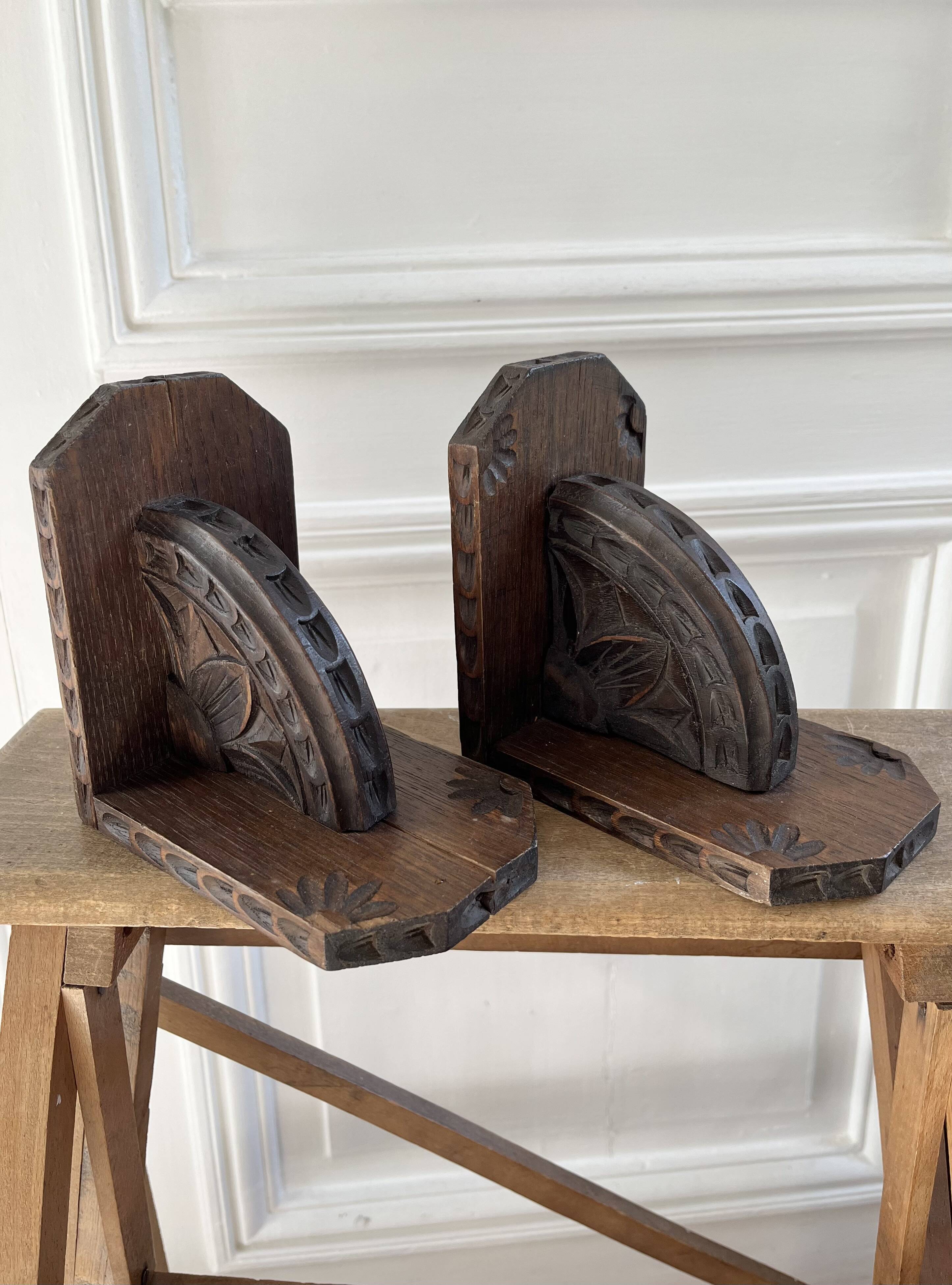 Pair of carved wooden bookends