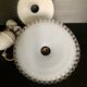 Suspension rises and falls opaline